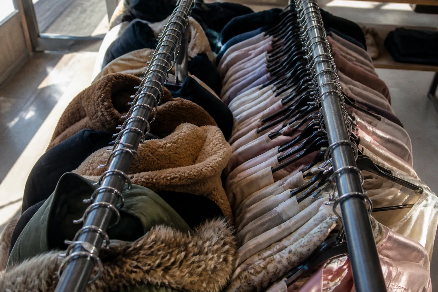 Double rail clothing racks: spacing traps that ruin garments